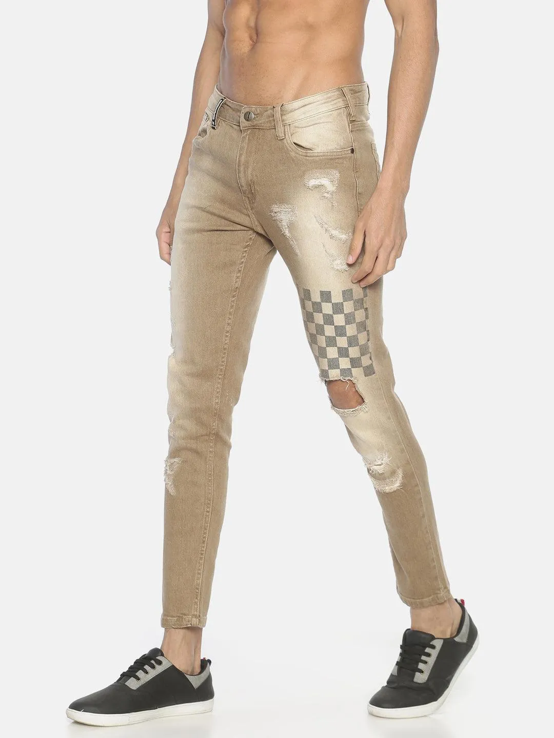Beige ripped printed denim jeans
