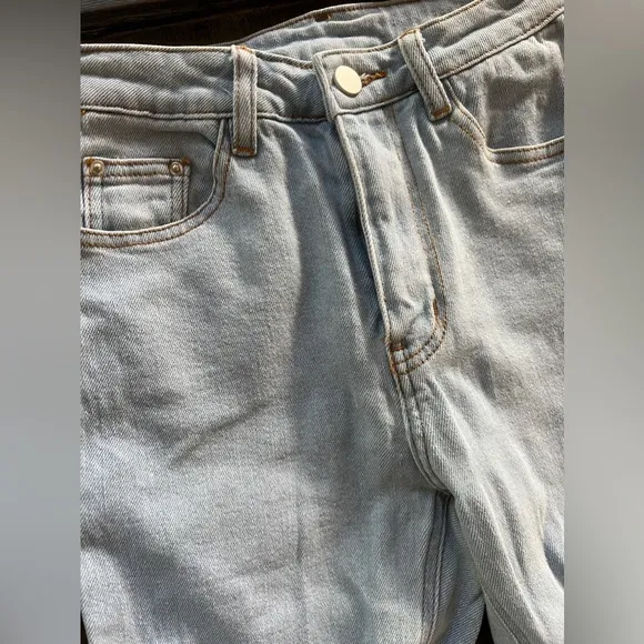 EGRIS distressed jeans never worn , no tag .