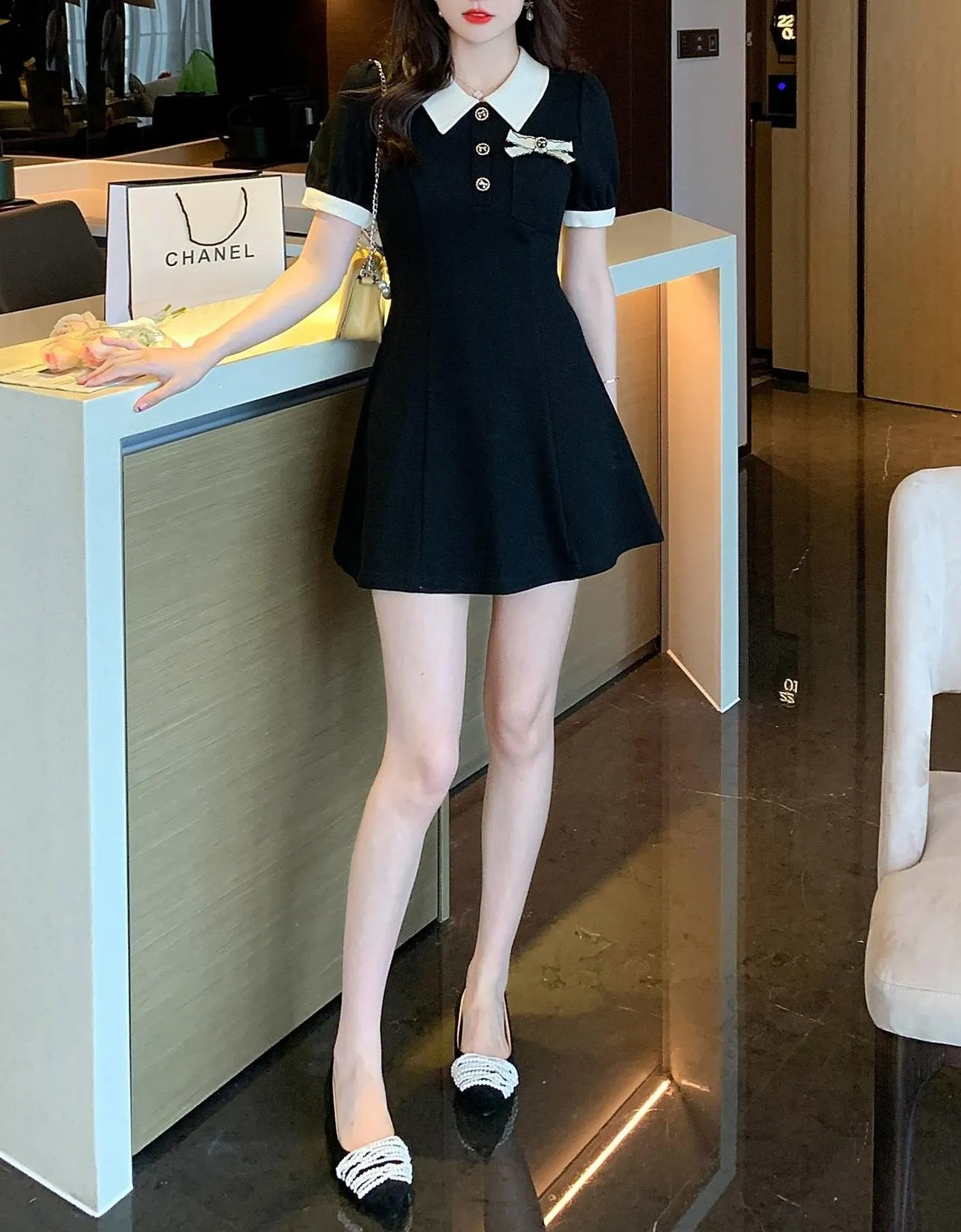 Elegant Button-up Skater Skater Dress with a Bow Decoration