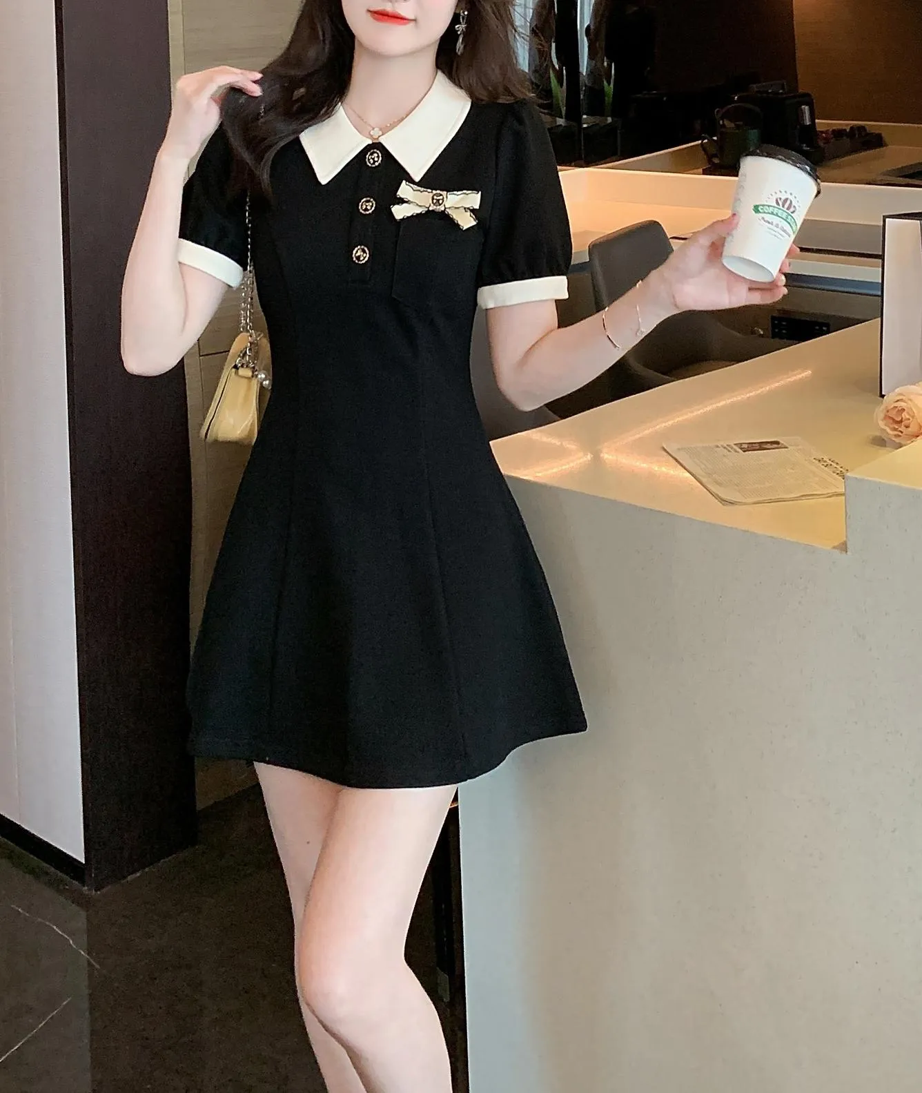 Elegant Button-up Skater Skater Dress with a Bow Decoration