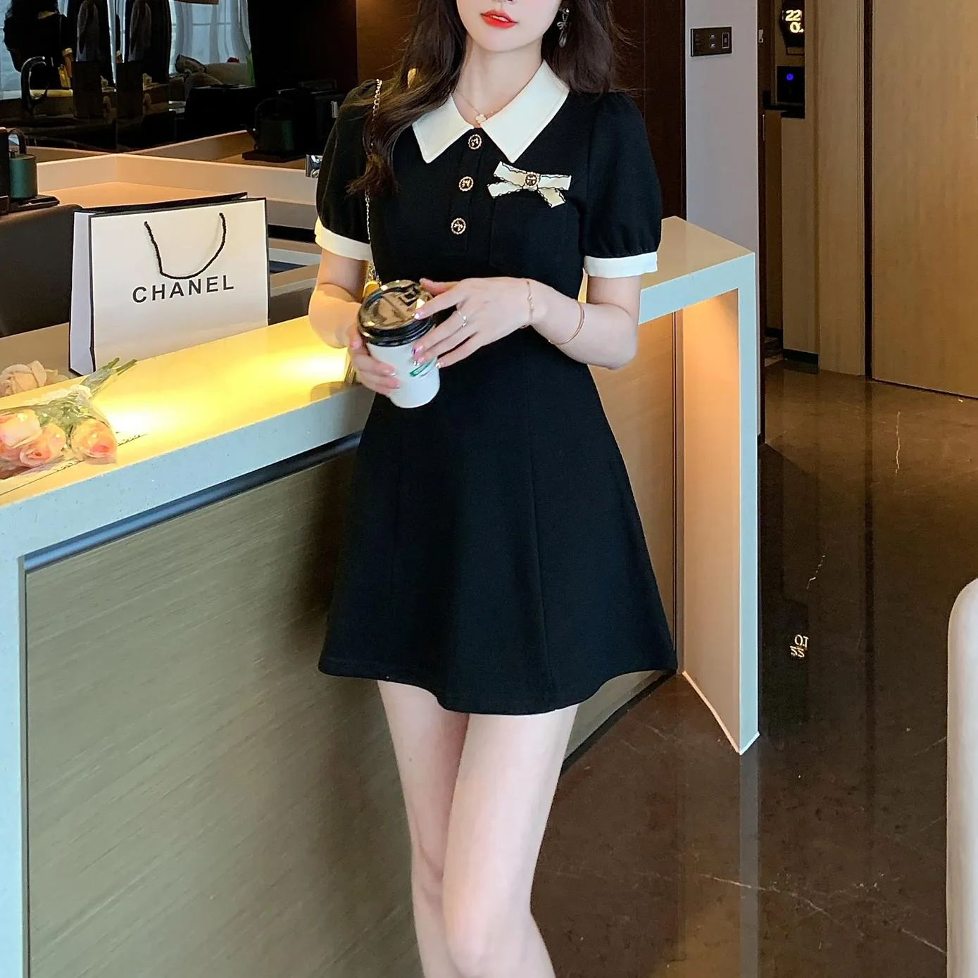 Elegant Button-up Skater Skater Dress with a Bow Decoration