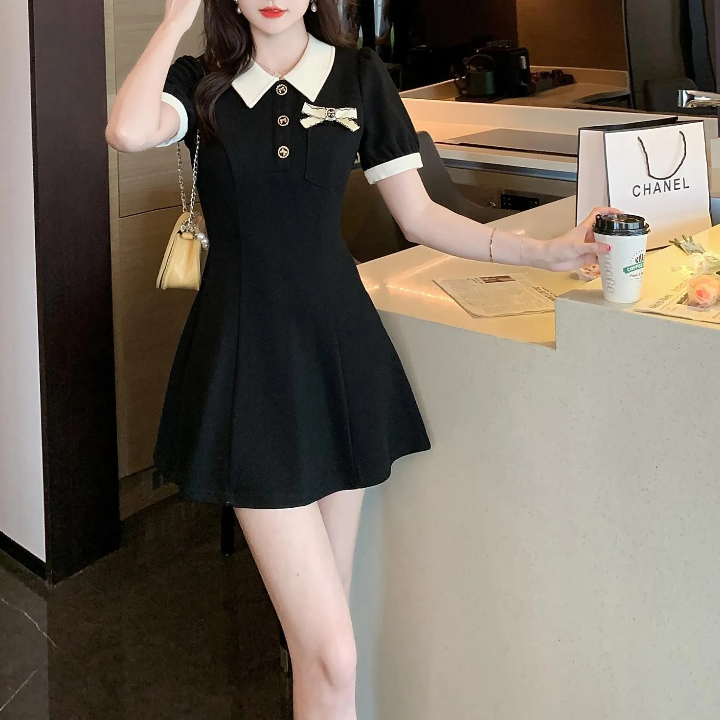 Elegant Button-up Skater Skater Dress with a Bow Decoration