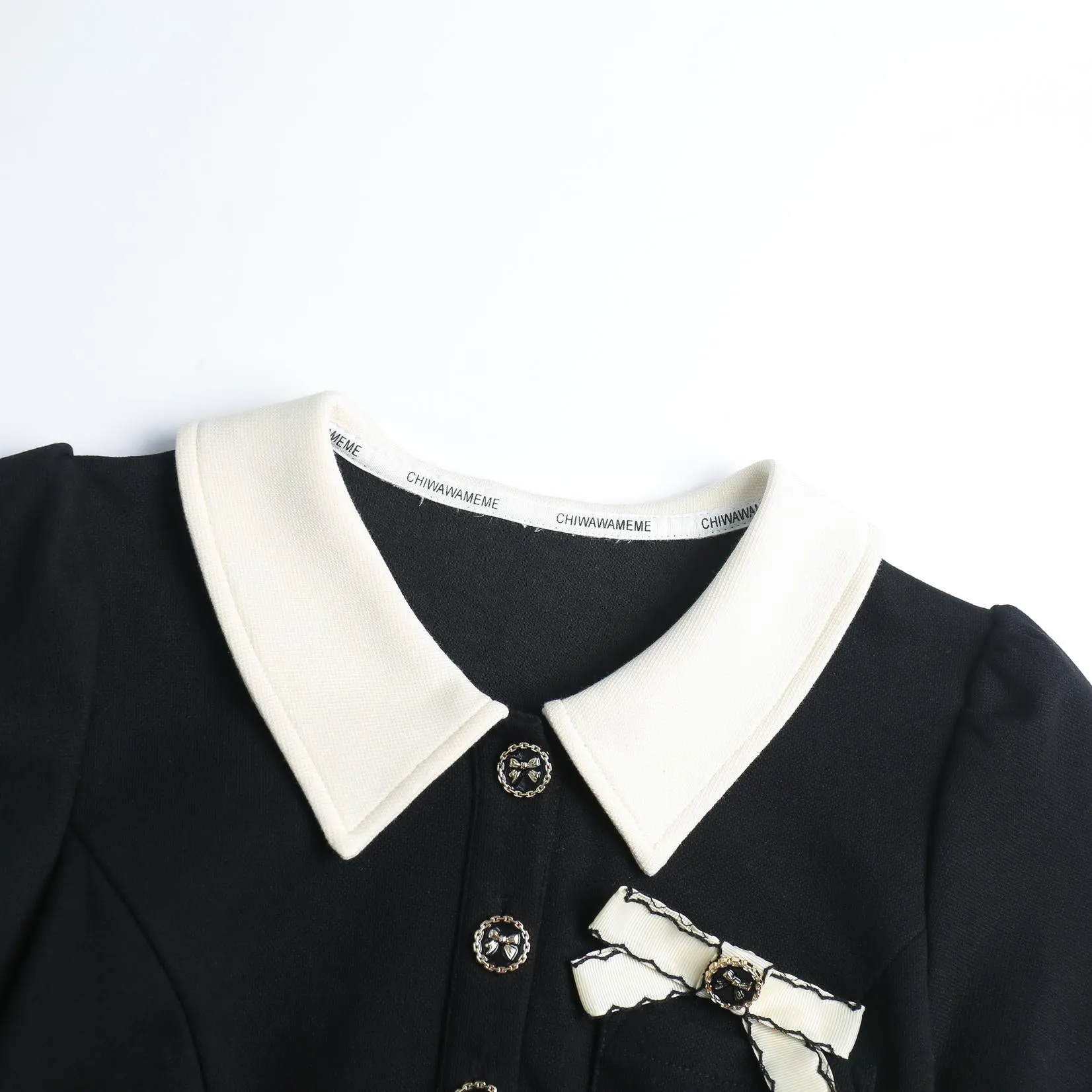 Elegant Button-up Skater Skater Dress with a Bow Decoration