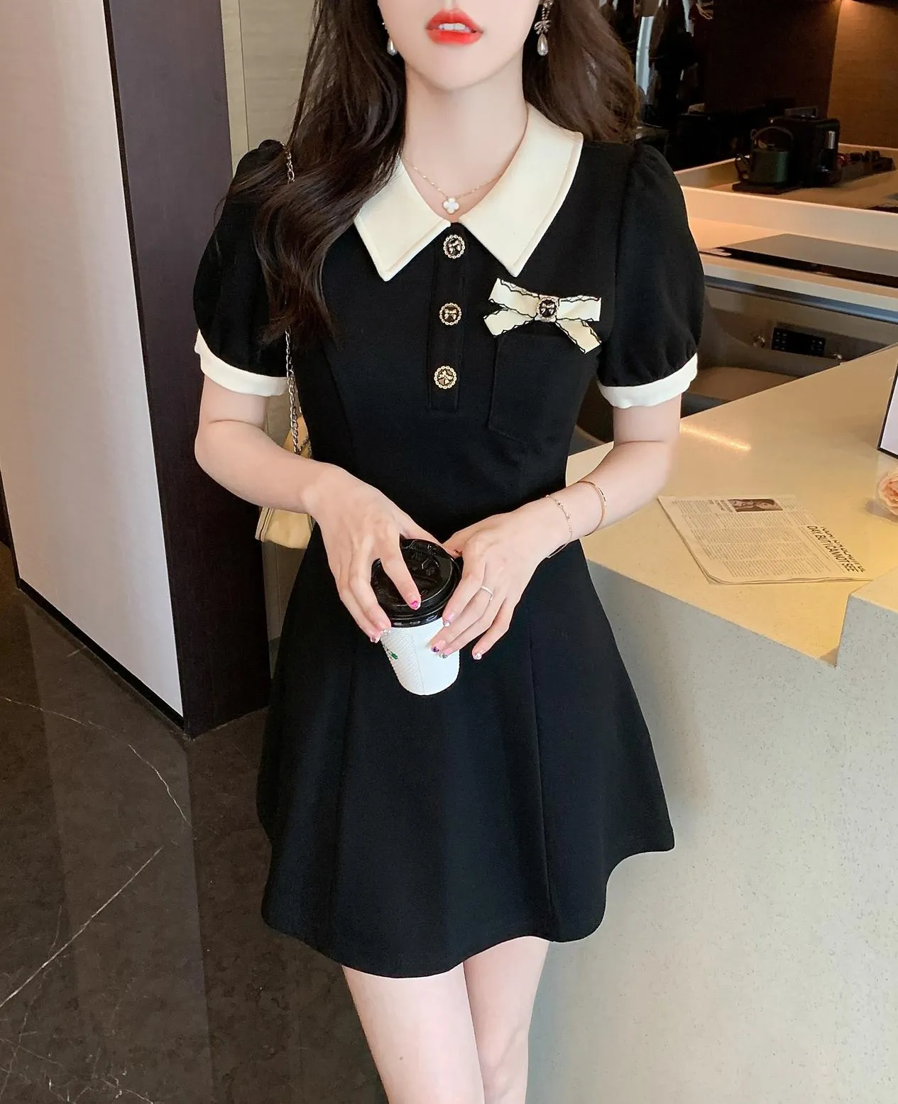 Elegant Button-up Skater Skater Dress with a Bow Decoration