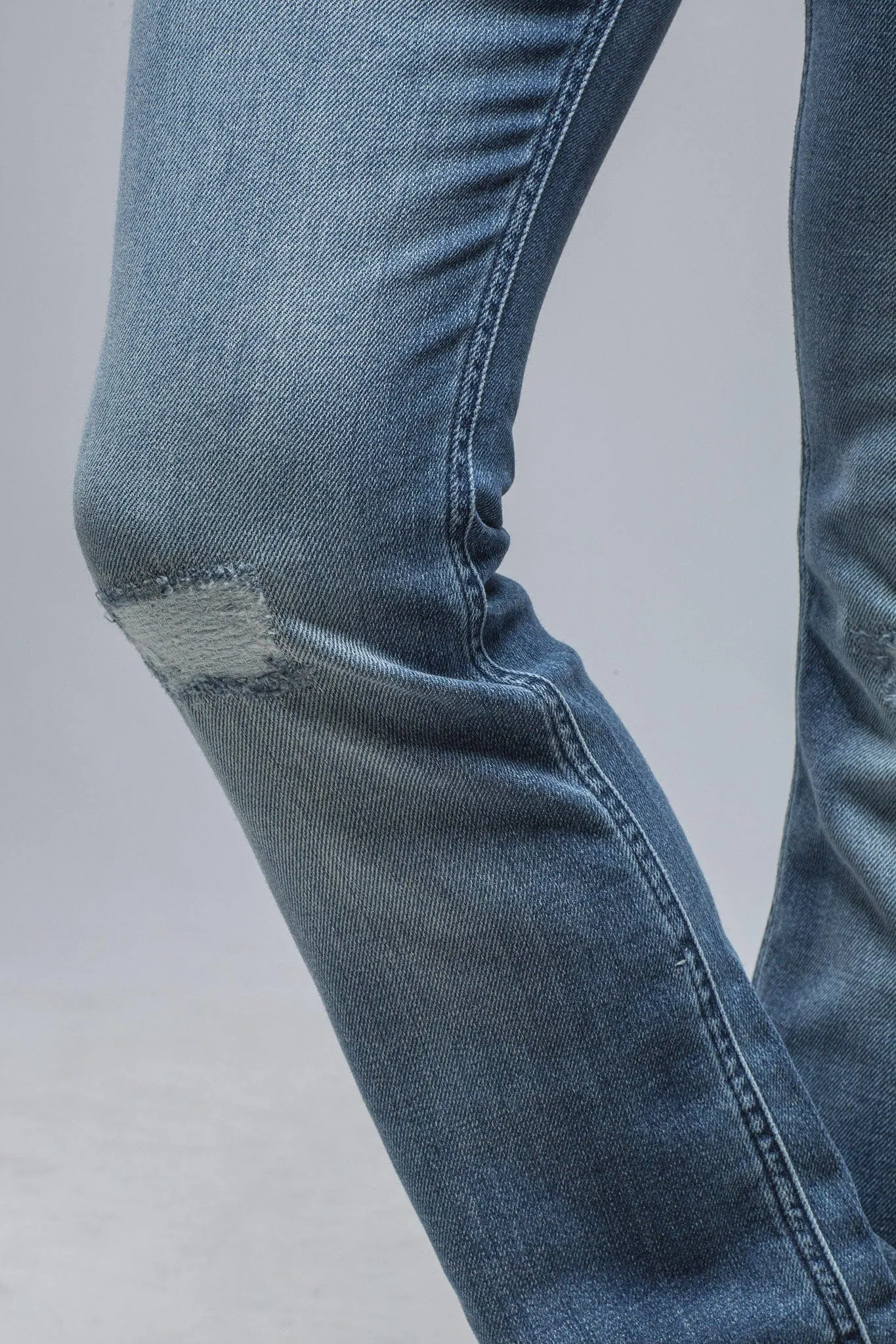 Tommy Ripped & Repaired Flare Jeans in Lt. Blue